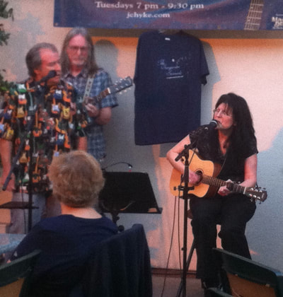 JC Hyke's "Songwriter Serenade": Ed Tree on guitar, Paul Marshall on harmony. (photo by Jeannie Willets)